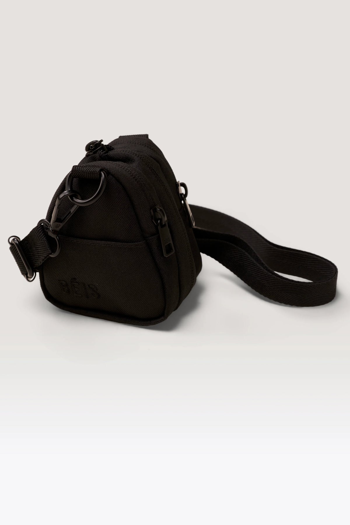 The Expandable Crossbody Charm in Black