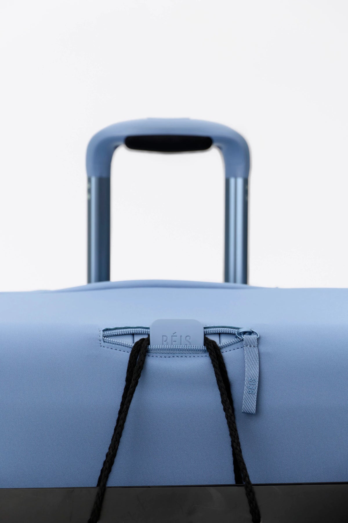 The Hybrid Carry-On Luggage Cover in Dusty Blue
